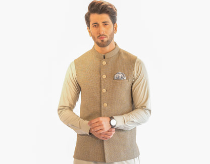 Explore exquisite men's waistcoat designs in our collection: Classic black, stylish blue, off-white, and brown shalwar kameez options available.